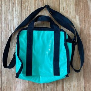 Green patent handbag with shoulder strap